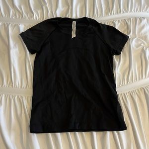 Black Swiftly tech, size 4, race length.